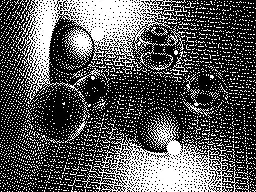 Une céation 3D très colorée sur l'Amiga 500 et devenue pixel art 2D en 2 couleurs sur le ZX Spectrum