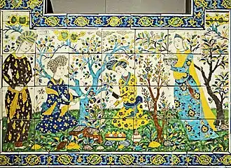 Iran, Ispahan : Panneau de céramique à la joute poétique (XVIIe&nbsp;siècle).