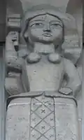 No&nbsp;42 : bas-relief sous le balcon.