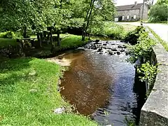 À Vallière, au pont de la RD 16.