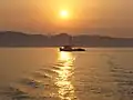 Bateau de pêcheur à l'aube dans l'archipel des Kornati.