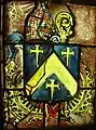 Blason de l'évêque Ferdinand de Neufville de Villeroy, au Centre International du Vitrail de Chartres : d'azur au chevron d'or, accompagné de trois croix pattées au pied fiché. Cimier : une crosse d'or accolée à une mitre au naturel. Soutien : deux palmes de sinople (effacé) reliées par un ruban de gueules.