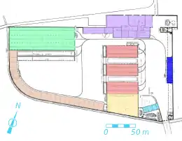 Dessin en couleurs des plans d'un ensemble de bâtiments.