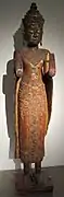 Buddha paré. Prov. exacte inconnue. XVIIIe-XIXe s. Bois de beng, laque, or, nacre et verre.H. 180 cm. Musée Guimet