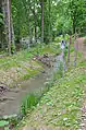 Le canal issu du Boiron. On aperçoit l'orifice du système de pompage.