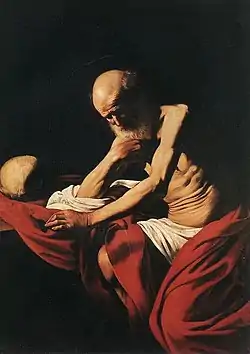 Peinture. Un vieil homme à la toge rouge médite dans une cellule obscure.