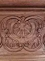 Détail d'une boiserie en forme de coquille Saint-Jacques