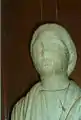 Détail de la statue de notable.