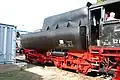 Un tender type « baignoire » attelé à une BR 52 allemande.