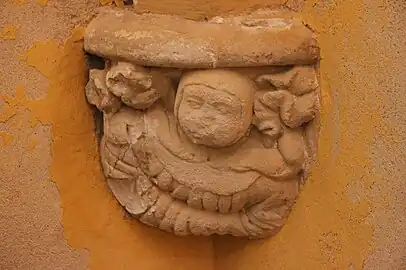 Delfau : culot sculpté.