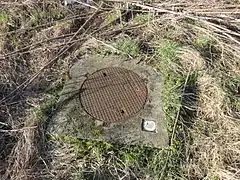 La tête de puits matérialisée Bellevue.