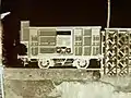 Détail d'un négatif de collodion humide de 1868, avec le laboratoire de J. Laurent dans un fourgon ferroviaire.