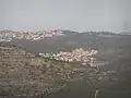 Village d'Ein Rafa dans la vallée devant celui de Meoz Zion sur la colline, 2013