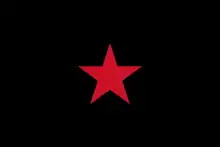 Une étoile rouge sur fond noir.