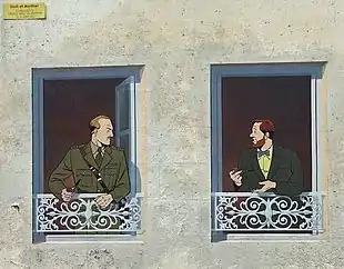 Fresque murale en trompe-l'œil montrant deux personnages.