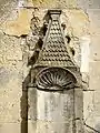 Façade occidentale, dais du portail de droite.
