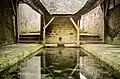 Fontaine de dévotion Saint-Aldric puis lavoir, construite avant 1827, reconstruite dans le 3e quart 19e siècle par l'entrepreneur Pierre Chauvin. Photo février 2017.