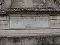 Plaque rappelant le transfert de Paris à Saint-Cloud en 1900.