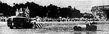 Photo illustrant une scène de course automobile.