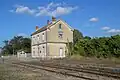 Gare de Clérac en octobre 2016. Le site et les voies sont désormais condamnés et ceinturés par une clôture métallique.