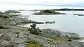Extrémité sud de Søndre Sandøy. Herføl en arrière-plan.