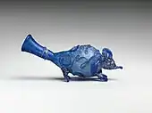 Souris. Flacon à serpentin, verre bleu, L. 14,6 cm. IIIe siècle EC. Met