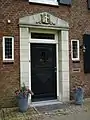 Haps, blason au-dessus de la porte de l'ancienne maison du maire