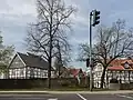 Tour de l'église avec pan de bois