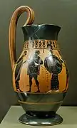 Olpé attique à figures noires, signée du potier Amasis, c. -540.