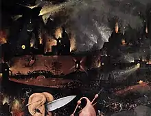 Une ville en flammes dans la nuit