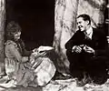 Allene Ray, dans le film Honeymoon Ranch (acteur non identifié).