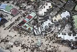 Dégâts à Philipsburg et arrivée du chaland Pelikaan le 8 septembre.