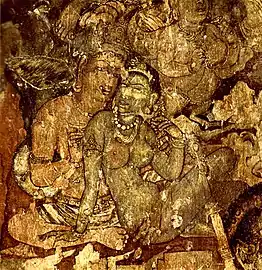Peintures endommagées d'un homme et d'une femme