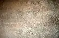 Dalle funéraire du chanoine Jean-Baptiste Peyrusse (1764-1832), visible dans la chapelle du cimetière Saint-Michel.