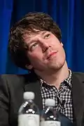 John Gallagher, Jr. dans le rôle de Jim Harper