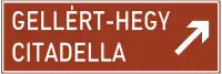 Panneau d'indication d'un lieu touristique complété