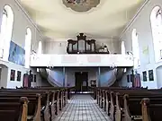 Vue intérieure de la nefvers la tribune.