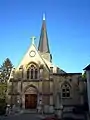 L'église, côté ouest, porche d'entrée.