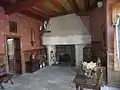 Ancienne cuisine (XIVe&nbsp;siècle) devenue salle à manger (XXe&nbsp;siècle).