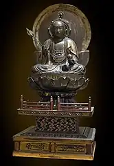 Le bodhisattva Jizo en moine au bâton de pèlerin. Fin Edo, Japon. Bois laqué et doré, H. 110&nbsp;cm.