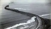 Un train de la Southern Pacific Transportation Company sur le quai (1895).