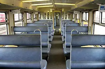 Intérieur d'une voiture rénovée de 2e&nbsp;classe.