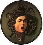 Peinture d'une tête coupée, grimaçante, la chevelure faite de serpents.