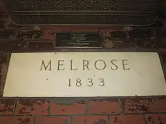 Plaque signalant la plantation de Melrose.