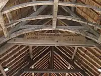 Charpente portant l'inscription fait par moi Ian Scordia, Antouen Garin fabric, 5 juillet 1698.