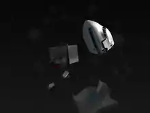 Image réalisée par ordinateur montrant, en contre-plongée, la section avant déchirée de l'avion ainsi que plusieurs débris comme des conteneurs à bagages tombant du ciel nuit noir.