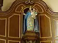 La statue miraculeuse de Notre-Dame-de-Foy de Coutiches, dans le transept de l'église du même nom.