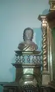 Personnage en bois figurant sur le retable.