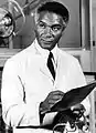 Percy Rodriguez(Dr Harry Miles)