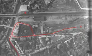 En rouge tracé ligne1 terminus et aubette, 2 dépôt,3 bâtiment de la gare.